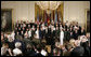 President George W. Bush and U.S. Secretary of Defense Robert Gates pose for a group photo at the commissioning ceremony for Joint Reserve Officer Training Corps Thursday, May 17, 2007, in the East Room of the White House. White House photo by Joyce Boghosian