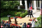 President George W. Bush and Prime Minister Tony Blair of the United Kingdom, walk to the podiums Thursday, May 17, 2007, to begin their joint press availability in the Rose Garden. The visit by Prime Minister Blair marks his last visit in that capacity following his announcement that he'll leave office in June. White House photo by Shealah Craighead