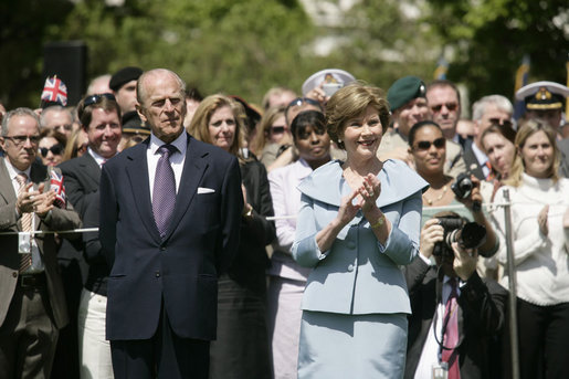 Mrs. Laura Bush is joined by His Royal Highness The Prince Philip, Duke of Edinburgh, at the state arrival ceremony for Her Majesty Queen Elizabeth II of Great Britain Monday, May 5, 2007, on the South Lawn of the White House. White House photo by Shealah Craighead