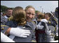 Graduates of the U.S. Military Academy Class of 2007 embrace Saturday, May 26, 2007, at the completion of commencement ceremonies in West Point, N.Y. White House photo by David Bohrer