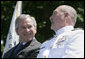 President George W. Bush talks with Admiral Thad Allen, Commandant of the U.S. Coast Guard, Wednesday, May 23, 2007, at the U.S. Coast Guard Academy commencement in New London, Conn. White House photo by Joyce Boghosian