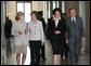 Mrs. Laura Bush is joined by U.S. Senators Kay Bailey Hutchison, R-Texas, left, Dianne Feinstein, D-Calif. and Mitch McConnell, R-Ky, right, as she arrives to attend the Senate Women’s Caucus Wednesday, May 23, 2007 at the U.S. Capitol in Washington, D.C., calling for the unconditional release of Nobel laureate and Myanmar opposition leader Aung San Suu Kyi. White House photo by Shealah Craighead