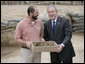 President George W. Bush shares a moment with Michael Lavin, senior conservator at the historic Jamestowne site Sunday, May 13, 2007, during a visit by the President and Mrs. Laura Bush in celebration of the settlement's 400th anniversary. The President urged all to come and see "the fantastic history that's on display." He added, "I think you'll be amazed at how our country got started." White House photo by Shealah Craighead