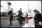 President George W. Bush and Mrs. Laura Bush are joined by Virginia Gov. Tim Kaine and his wife, Anne Holton, and former Supreme Court Justice Sandra Day O'Connor as they talk with Josiah Freitus, a sail maker, during a visit to Jamestown Settlement Sunday, May 13, 2007, in Jamestown, Va. White House photo by Shealah Craighead