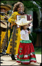 Performer Angelica Mora Arriaga, a member of the Los Hermanos Mora Arriaga mariachi band, performs with family members in the Rose Garden at the White House Friday, May 4, 2007, during a celebration of Cinco de Mayo. White House photo by Eric Draper