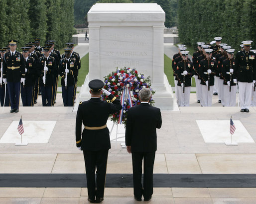 President George W. Bush is joined by Major General Guy Swan III, left, commander of the Military District of Washington, during the Memorial Day commemoration wreath laying ceremony at the Tomb of the Unknowns Monday, May 28, 2007, at Arlington National Cemetery in Arlington, VA. White House photo by Shealah Craighead