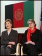 Laura Bush and U.S. Secretary of Education Margaret Spellings are seated together onstage at Kabul University Wednesday, March 30, 2005 in Kabul, Afghanistan. Mrs. Bush and Secretary Spellings toured the Women’s Teacher’s Training Institute and the National Women’s Dormitory prior to Mrs. Bush's announcement of the United States' commitment to provide more than 15 million dollars in funds for building a new university in Kabul. White House photo by Susan Sterner