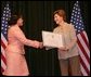 Laura Bush hands out awards at the Institute of Museum and Library Services (IMLS) ceremony, March 14, 2005 at the Hotel Washington in Washington, D.C. White House photo by Susan Sterner