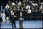 President George W. Bush and guests applaud Secretary Michael Chertoff after he was sworn in as the second Secretary of Homeland Security Thursday. Mar. 3, 2005. White House photo by Paul Morse