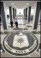 Walking through the main lobby, President George W. Bush and Porter Goss, director of the Central Intelligence Agency, head to a brief news conference at CIA headquarters Thursday, March 3, 2005, in Langley, Va. White House photo by Paul Morse