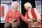 Former First Lady Barbara Bush speaks with Myrtle Campbell during a discussion on strengthening Social Security at Pensacola Junior College in Pensacola, Fla., Friday, March 18, 2005. White House photo by Eric Draper