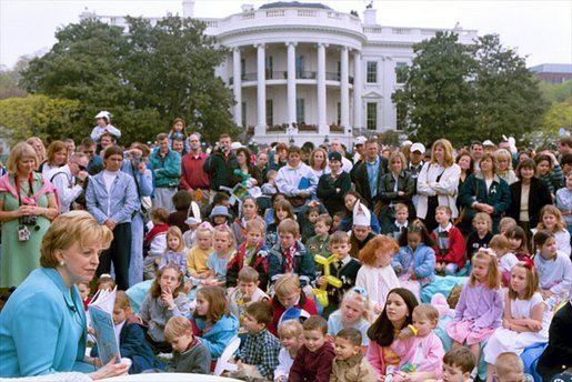 Lynne Cheney reads from her book, "America: A Patriotic Primer," at the White House Easter Egg Roll Monday, April 21, 2003. Accompanying Mrs. Cheney, several Cabinet members and authors also read to children during the day. File photo. White House photo by Susan Sterner