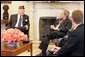 President George W. Bush meets with John Furgess, the National Commander-in-Chief of the Veterans of Foreign Wars, in the Oval Office Monday, March 14, 2005. White House photo by Krisanne Johnson