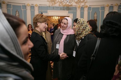Laura Bush greets Afghan Ministers during her visit to the State Department for an International Women's Day Forum in Washington, D.C., Tuesday, March 8, 2005 White House photo by Susan Sterner