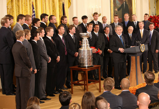 President George W. Bush welcomes the Detroit Red Wings NHL Hockey team, winners of the 2008 Stanley Cup, Tuesday, Oct. 14, 2008, to the East Room at the White House. White House photo by Chris Greenberg