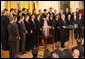 President George W. Bush welcomes the Detroit Red Wings NHL Hockey team, winners of the 2008 Stanley Cup, Tuesday, Oct. 14, 2008, to the East Room at the White House. White House photo by Chris Greenberg