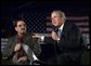 President George W. Bush speaks with Vincent Trapani, President of USA Industries, during a conversation on the economy and job training in Bay Shore, New York, Thursday, March 11, 2004. White House photo by Eric Draper.