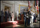 President George W. Bush stands with Dr. Norman Bourlag during the Congressional Gold Medal Ceremony honoring the doctor's efforts to combat hunger Tuesday, July 17 , 2007, at the U.S. Capitol. "Norman Borlaug's life has taken him from laboratories in America and Mexico to dusty villages throughout the developing world," said the President in his remarks. White House photo by Chris Greenberg