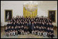 President George W. Bush poses with boy members of the 2007 Boys and Girls Nation delegates Wednesday, July 25, 2007, following his address to the group in the East Room of the White House. White House photo by Joyce N. Boghosian