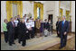 President George W. Bush talks with some of the winners in the FIRST Competition (For Inspiration and Recognition of Science and Technology) Monday, April 30, 2007, at the White House. Founded in 1989, the program encourages young students to pursue education and career opportunities in science, technology, engineering, and math, while building self-confidence, knowledge, and life skills. White House photo by Joyce Boghosian