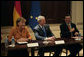 President George W. Bush, center, European Commission President Jose Manuel Barroso, right, and Chancellor Angela Merkel of the Federal Republic of Germany, left, meet with members of the TransAtlantic Business Dialogue during an April 30, 2007 meeting in the Dwight D. Eisenhower Executive Office Building in Washington, D.C. White House photo by Eric Draper