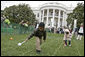 Eggs roll, drop, hop and even fly as children take part in the traditional mainstay of the 2007 White House Easter Egg Roll on the South Lawn Monday, April 9 2007. White House photo by Shealah Craighead