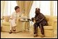 Mrs. Laura Bush visits with Nigeria President Olusegun Obasanjo Wednesday, Jan. 18, 2006, at the presidential villa in Abuja, Nigeria. White House photo by Shealah Craighead