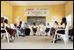 Laura Bush and daughter Barbara participate in a round-table discussion with students Wednesday, Jan. 18, 2006, at Model Secondary School in Abuja, Nigeria. White House photo by Shealah Craighead