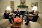 President George W. Bush meets with Tom Bock, the national commander of the American Legion, in the Oval Office Tuesday, Jan. 17, 2006. Also pictured, from left, are: John Sommer, executive director of the American Legion's Washington office, and Jim Nicholson, Secretary of Veterans Affairs. White House photo by Paul Morse