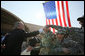 President George W. Bush reaches out to shake the hands of troops Saturday, Jan. 12, 2008, during his visit to Camp Arifjan, the last stop in his Kuwait tour before continuing on to Bahrain. White House photo by Eric Draper