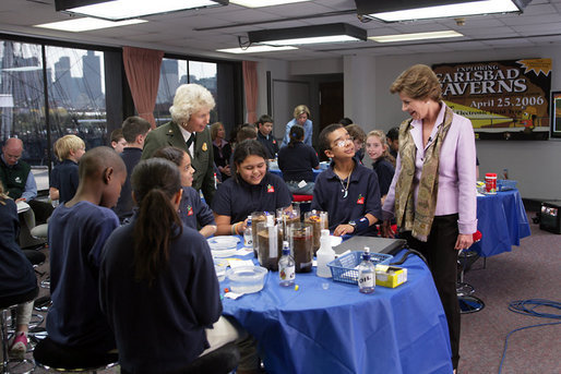 On a visit to Charlestown Navy Yard in Boston, Mass., during National Park Week, Mrs. Laura Bush and students from Warren-Prescott School, participate in an electronic field trip to Carlsbad Caverns National Park, N.M., Tuesday, April 24, 2006. Electronic field trips allow students to virtually visit, via the internet, US National Parks and are made possible through partnerships between Ball State University and museums across the country. White House photo by Shealah Craighead