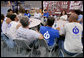 President George W. Bush meets with volunteers from Hands On Network at their base camp in Biloxi, Mississippi, Thursday, April 27, 2006. White House photo by Eric Draper