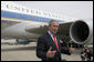 Standing outside Air Force One in Charlotte, N.C., President George W. Bush addresses the media after speaking about the War on Terror at Central Piedmont Community College Thursday, April 6, 2006. White House photo by Paul Morse