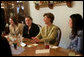 Mrs. Laura Bush shares in laughter with girls who are living in a family-style residential group home at Father Flanagan’s Girls & Boys Town in Omaha, NE, Monday, April 3, 2006. Girls and Boys Town was founded in 1917 to help troubled boys. Today there are more than 100 long-term, residential-care homes for trouble youths, featuring family-style living in the least restrictive environment. White House photo by Shealah Craighead