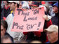 A young Reds fan tries to get President Bush’s attention during the opening game between the Cincinnati Reds and the Chicago Cubs in Cincinnati, Ohio, Monday, April 3, 2006. White House photo by Kimberlee Hewitt