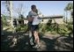 President George W. Bush consoles a resident during a tour of hurricane damage in Punta Gorda, Fla., Sunday, Aug. 15, 2004.