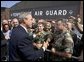 President George W. Bush greets base personnel and their families before departing Nashville International Airport-Tennessee Air National Guard, Tuesday, Aug. 31, 2004. White House photo by Eric Draper.