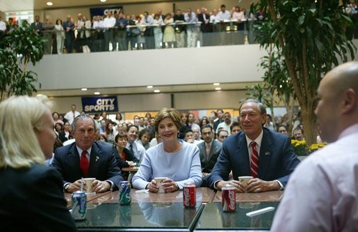 Laura Bush, New York Mayor Michael Bloomberg, left, and Governor George Pataki meet with employees at Citigroup headquarters in New York, N.Y., Monday, Aug. 2, 2004. The Citigroup building is one of five locations identified as a possible terrorist target. White House photo by Joyce Naltchayan.