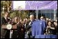 After congratulating NASA staff on the successful landing of the robotic rover Spirit on Mars, Vice President Dick Cheney holds up a shirt bearing the Spirit emblem at the Jet Propulsion Laboratory in Pasedena, Calif., Jan. 14, 2004. White House photo by David Bohrer