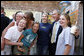 President George W. Bush poses for photos with customers during an unscheduled stop Tuesday, Aug. 22, 2006, to enjoy some vanilla custard at Glaciers Custard and Coffee Cafe in Wayzata, Minn. President Bush earlier had participated in a health care panel discussion in Minnetonka, Minn. White House photo by Paul Morse