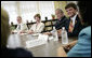 President George W. Bush and Laura Bush participate at a roundtable discussion Tuesday, Aug. 29, 2006, at Warren Easton Senior High School in New Orleans on the importance of rebuilding schools and school libraries, as the Gulf Coast marked the one- year anniversary of Hurricane Katrina. Mrs. Bush, speaking about the Laura Bush Foundation for America’s Libraries Gulf Coast School Library Recovery Initiative, congratulated the ten schools represented at the table on being awarded the first-round grants to help rebuild their schools. White House photo by Eric Draper