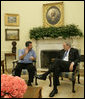 President George W. Bush shares a moment with Rockey Vaccarella Wednesday, Aug. 23, 2006, in the Oval Office of the White House. The St. Bernard Parish resident who drove from Louisiana to meet with the President said "I wanted to thank President Bush for the millions of FEMA trailers that were brought down there." He added, ". I just don't want the government and President Bush to forget about us." White House photo by Paul Morse