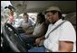 President George W. Bush visits with vicitims of Hurricane Frances at an emergency relief center in Ft. Pierce, Fla., Wednesday, Sept. 8, 2004. White House photo by Eric Draper