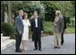 President George W. Bush and Laura Bush greet European Commission President Romano Prodi on his arrival to the G8 Summit on Sea Island, Ga., Tuesday, June 8, 2004. White House photo by Tina Hager