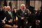 Former British Prime Minister Margaret Thatcher is greeted by former Canadian Prime Minister Brian Mulroney and Former Soviet President Mikhail Gorbachev before the funeral service for former President Ronald Reagan at the National Cathedral in Washington, DC on June 11, 2004. White House photo by Paul Morse.