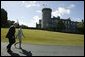 Laura Bush and Ireland’s Deputy Chief of Protocol Joe Brennan walk along the grounds of Dromoland Castle during a day of meetings between the United States and European Union in Shannon, Ireland, Saturday, June 26, 2004. White House photo by Joyce Naltchayan