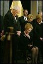 Vice President Dick Cheney, Nancy Reagan and other mourners bow their heads during the State Funeral Ceremony in the Rotunda of the U.S. Capitol Wednesday, June 9, 2004. White House photo by David Bohrer.