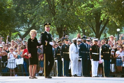 Nancy Reagan looks on as former President Ronald Reagan's casket is transfered onto a horse-drawn caisson at 1600 Constitution Avenue near the White House , Wednesday, June 9, 2004. White House photo by Joyce Naltchayan.