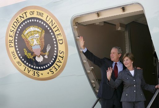 President George W. Bush and Mrs. Laura Bush wave from Air Force One as they depart Ataturk International Airport in Istanbul, Turkey, Turkey, Tuesday, June 29, 2004. White House photo by Eric Draper.