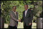 President George W. Bush and President Tabare Vazquez shake hands after a their joint press availability Saturday, March 10, 2007, at Estancia Anchorena. President Bush pledged to work hard for a compassionate and rational immigration law "that respects the rule of law, but also respects the great traditions of the United States, a tradition which is a welcoming society." White House photo by Paul Morse